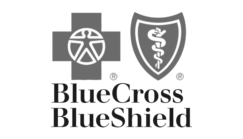 The blue cross blue shield logo on a gray background in Dothan.